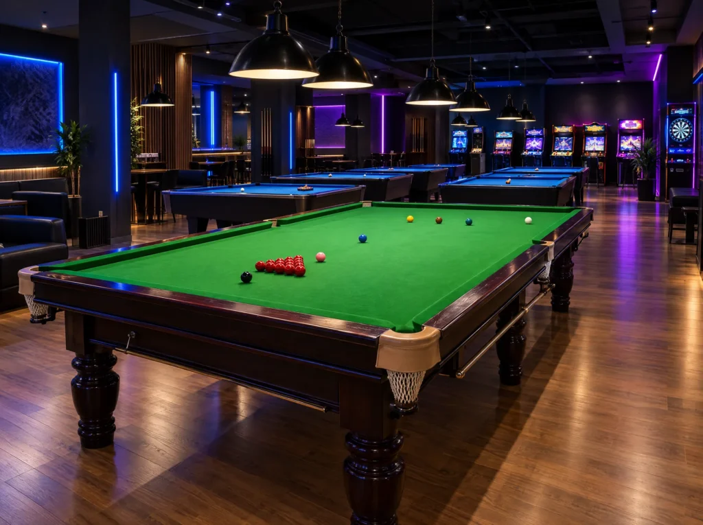 Billiards hall with pool tables under pendant lights